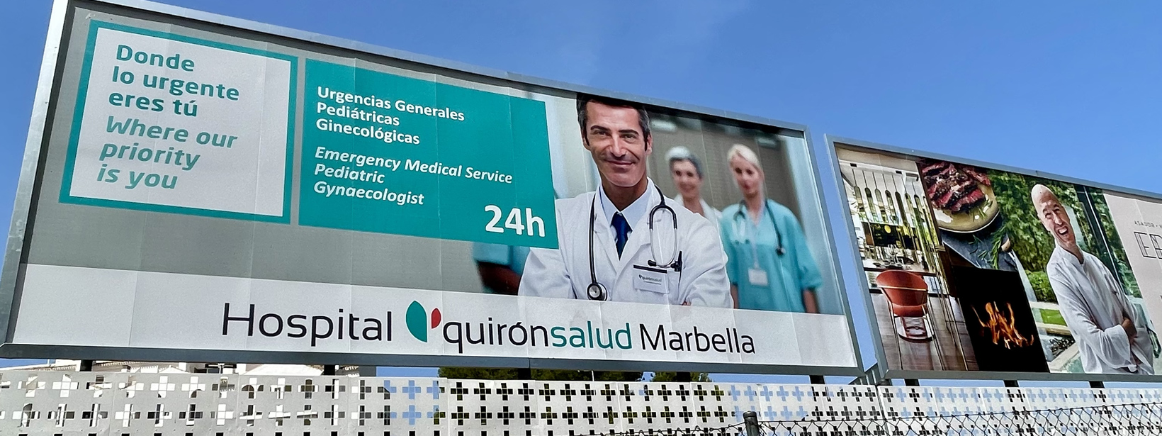 Valla publicitaria de 8x3 metros de Hospital Quiron Salud en Marbella